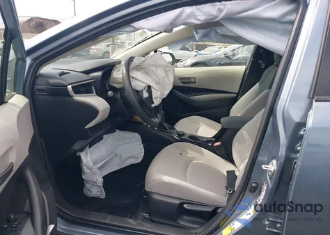 2022 Toyota Corolla Hybrid Le z USA, uszkodzony, nr VIN JTDEAMDE9NJ057489